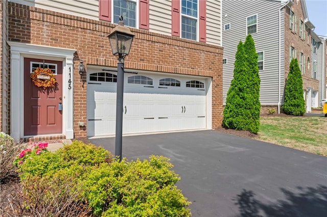 exterior space with a garage