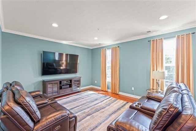 living room featuring ornamental molding and hardwood / wood-style floors