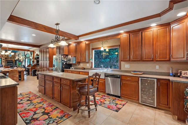 kitchen with appliances with stainless steel finishes, wine cooler, crown molding, backsplash, and brown cabinetry