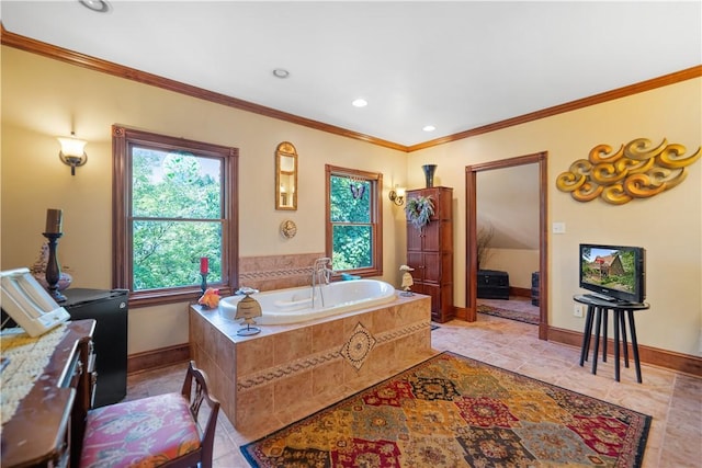 bathroom with ornamental molding, baseboards, a garden tub, recessed lighting, and tile patterned floors