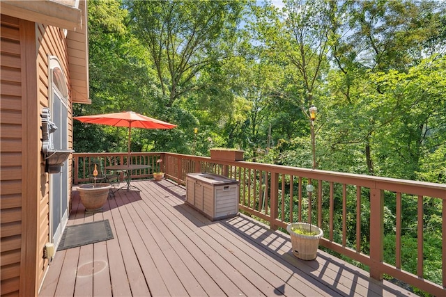 deck with view of wooded area