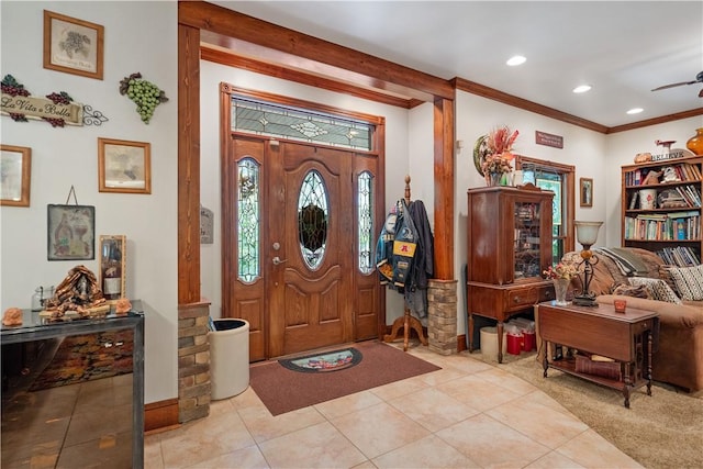 entrance foyer featuring crown molding, light tile patterned flooring, recessed lighting, and ceiling fan