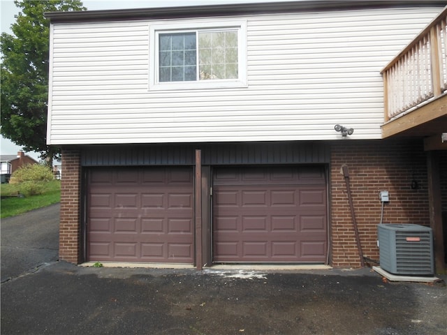 garage featuring central air condition unit