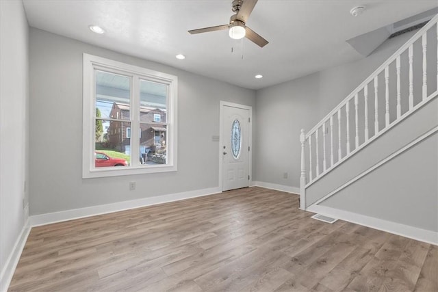 entryway with recessed lighting, visible vents, stairway, wood finished floors, and baseboards