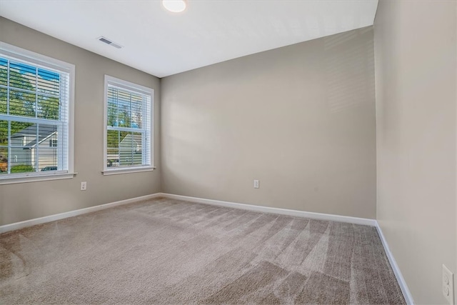 view of carpeted spare room