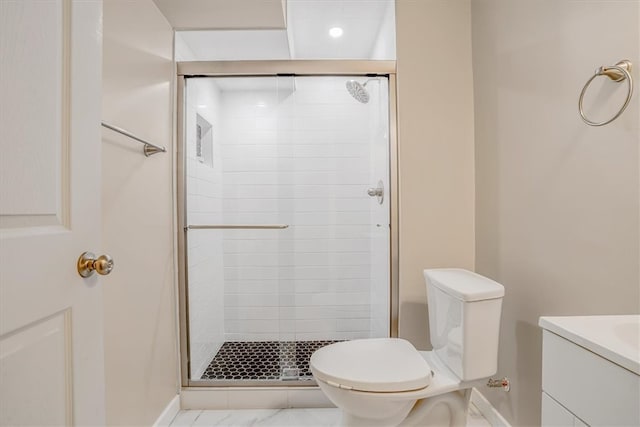 bathroom featuring an enclosed shower, tile patterned floors, vanity, and toilet