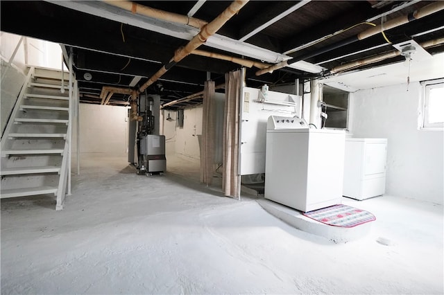 basement featuring washing machine and dryer