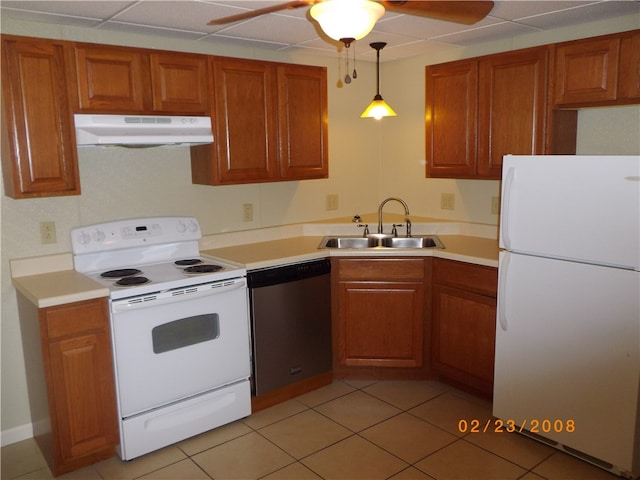 kitchen featuring pendant lighting, white appliances, light tile patterned floors, ceiling fan, and sink