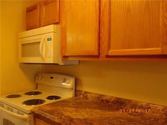 kitchen featuring white appliances