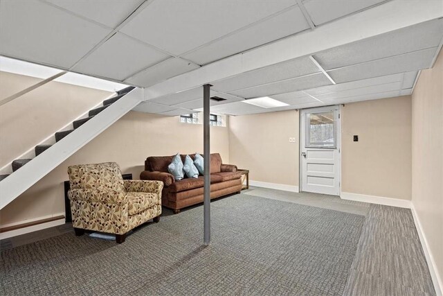 interior space featuring a paneled ceiling