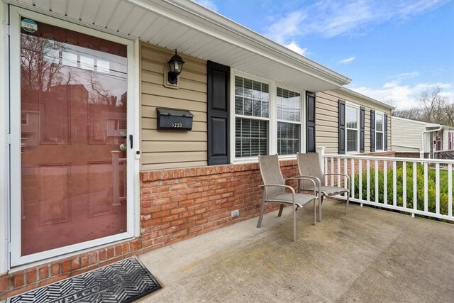 property entrance with a porch