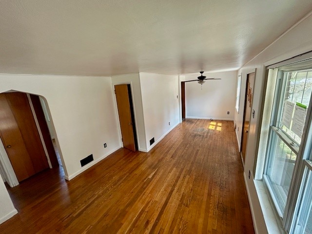 interior space featuring ceiling fan and hardwood / wood-style flooring