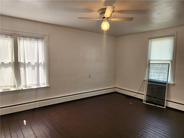 unfurnished room featuring dark hardwood / wood-style floors and ceiling fan