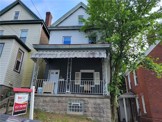 view of front facade with covered porch