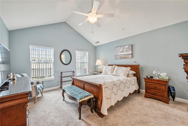 carpeted bedroom featuring ceiling fan and high vaulted ceiling