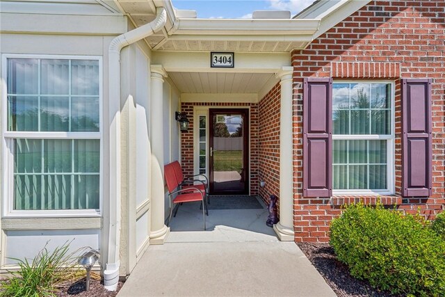 entrance to property featuring a patio area