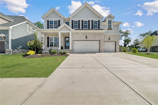 view of front facade with a front lawn and a garage