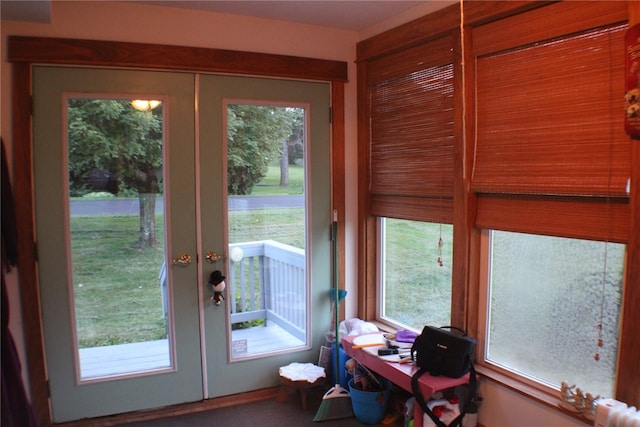 entryway featuring a healthy amount of sunlight and french doors