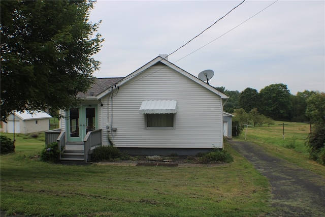 exterior space with a lawn