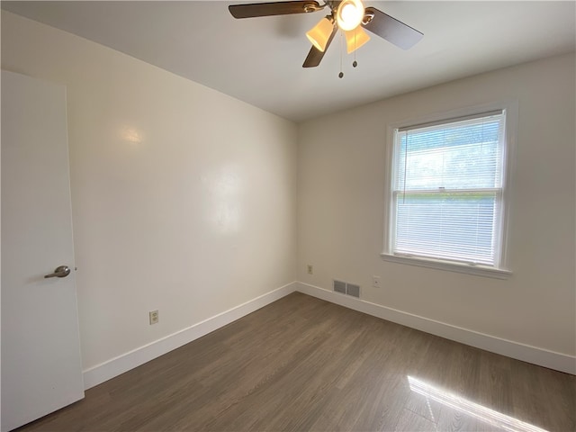 empty room featuring ceiling fan and wood-type flooring