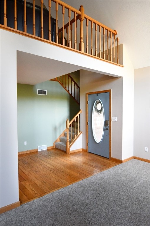 foyer with hardwood / wood-style flooring