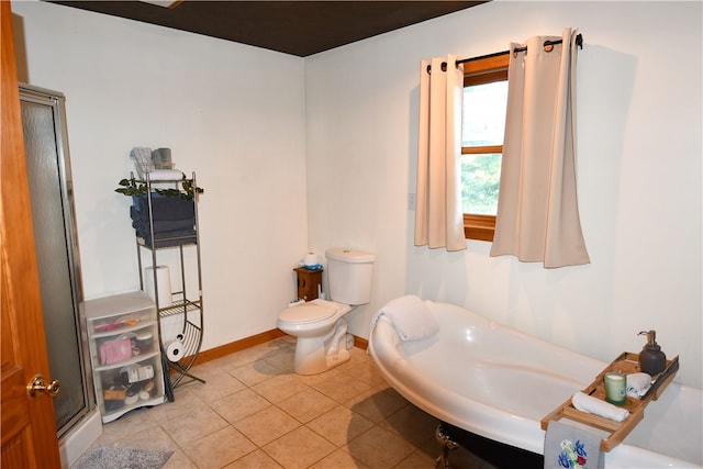 bathroom with tile patterned floors, an enclosed shower, and toilet