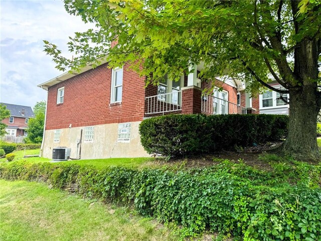 view of property exterior featuring central air condition unit