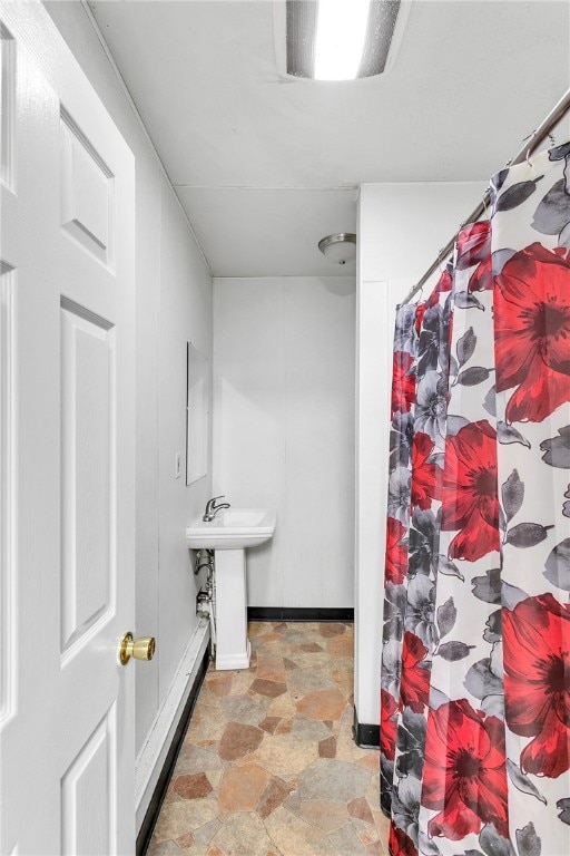 bathroom featuring sink and tile patterned floors