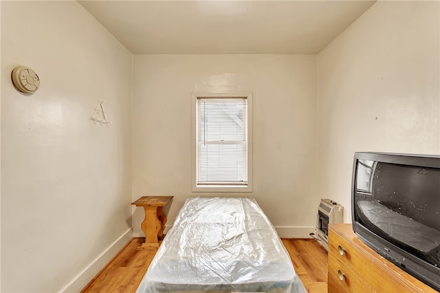 bedroom featuring light hardwood / wood-style floors