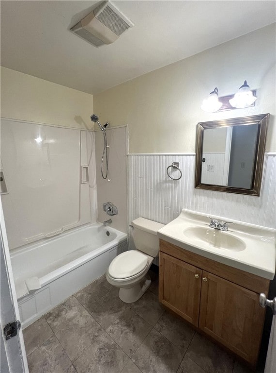 full bathroom featuring tile patterned flooring, toilet, shower / bathing tub combination, and vanity