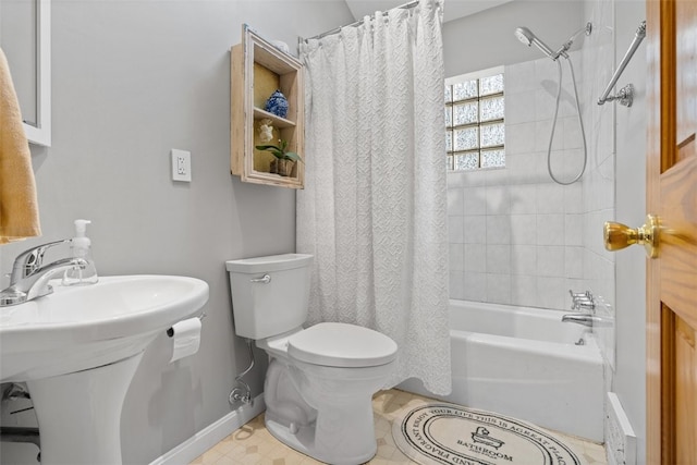 bathroom with shower / bath combination with curtain and toilet