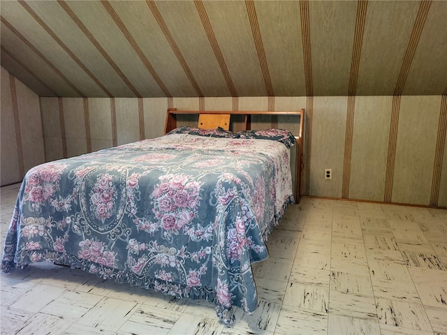 bedroom featuring vaulted ceiling