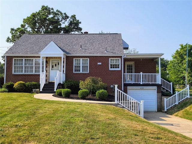 view of front of home featuring a garage and a front lawn