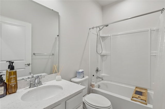 full bathroom with washtub / shower combination, toilet, and vanity