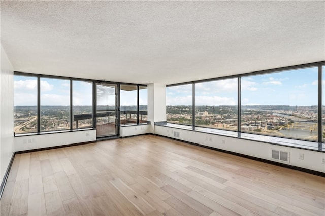 unfurnished sunroom with a healthy amount of sunlight