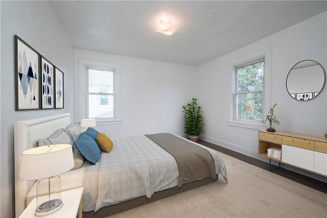 bedroom featuring baseboards