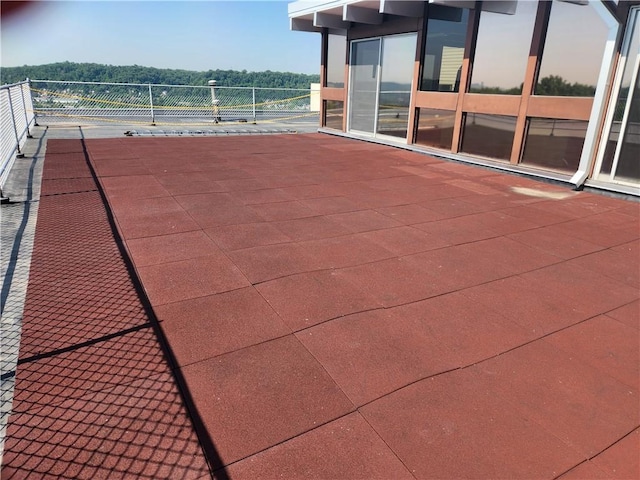 view of patio with a balcony