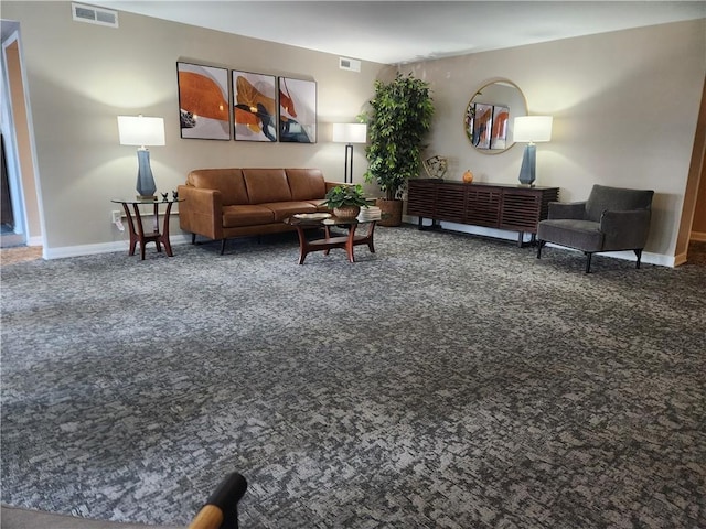 living room with dark carpet