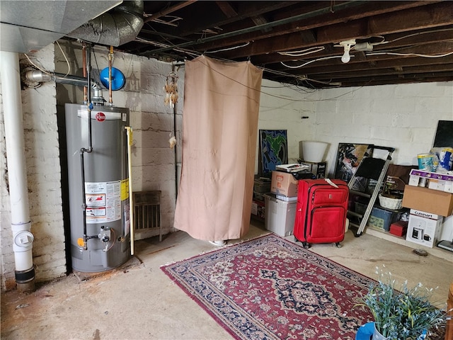 basement featuring water heater