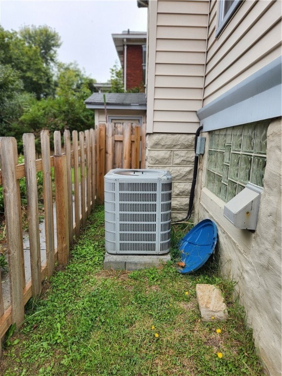 view of yard featuring central air condition unit