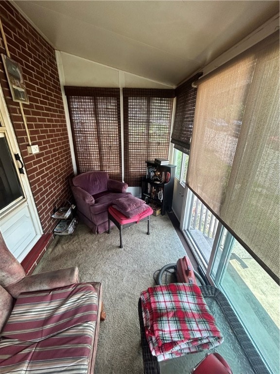 sunroom / solarium with lofted ceiling