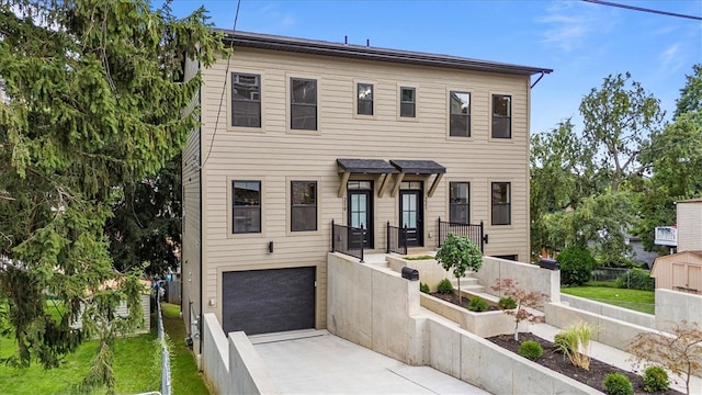 view of front of home featuring a garage