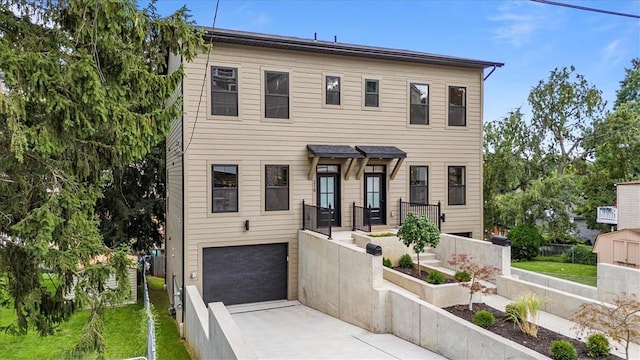 view of front of house with a garage