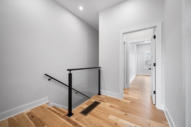 corridor featuring light wood-type flooring