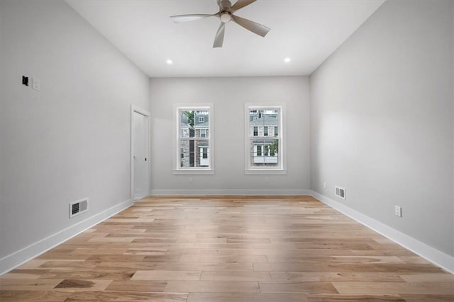 unfurnished room featuring ceiling fan and light hardwood / wood-style flooring