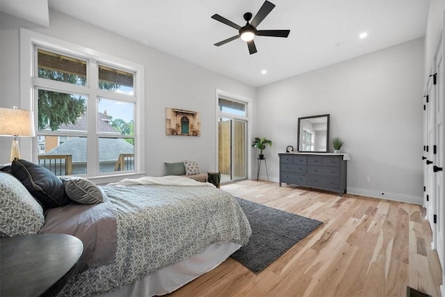 bedroom featuring ceiling fan and light hardwood / wood-style flooring