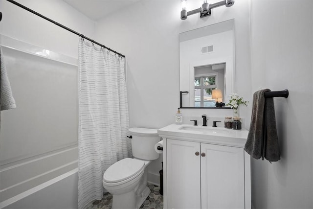 full bathroom featuring toilet, shower / bath combo, and vanity