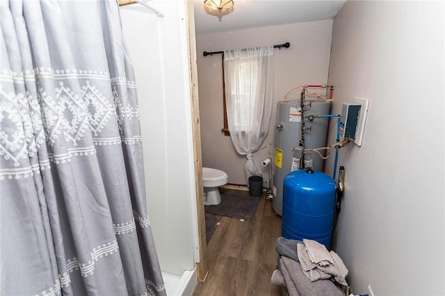utility room featuring water heater