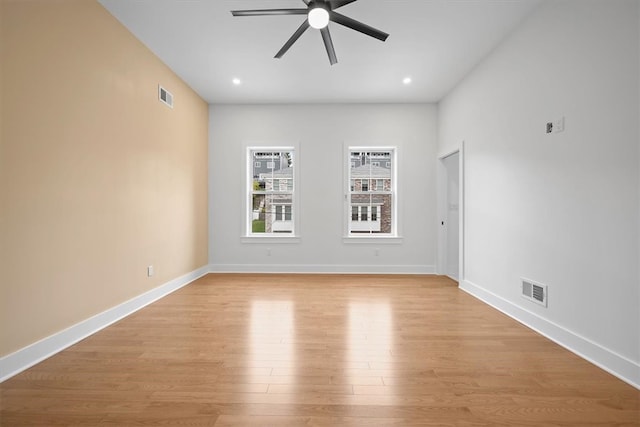 unfurnished room with light hardwood / wood-style flooring and ceiling fan