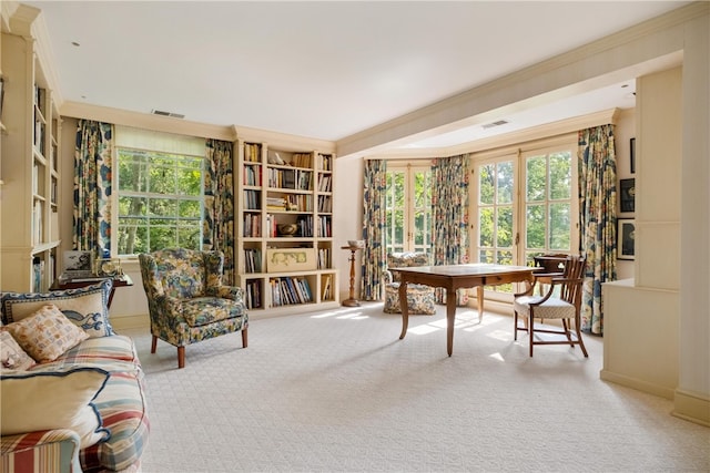 office area with light colored carpet and crown molding